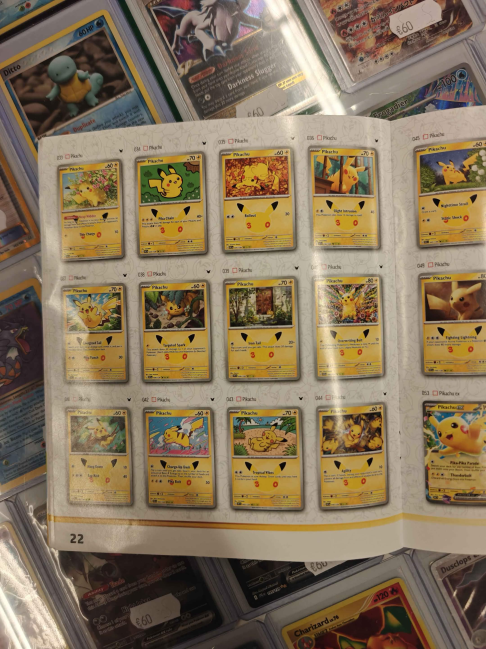 Leaked 30th Celebration set list booklet page 22 showing more than a dozen classic Pikachu reprints