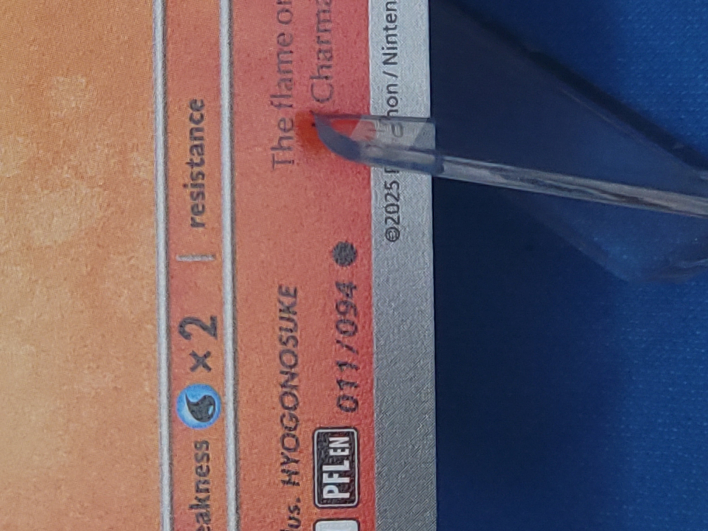 Common card showing the black circle rarity symbol near the card number