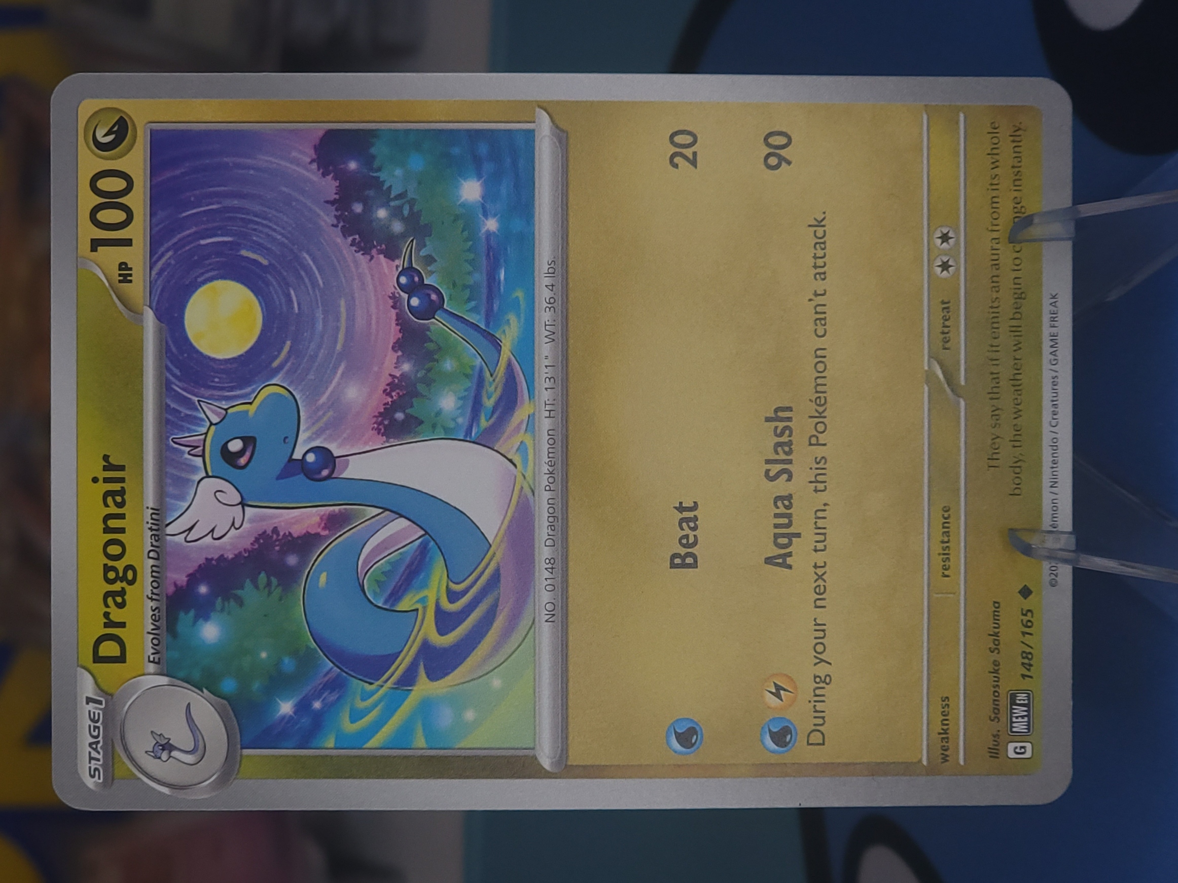 Full view of a Dragonair card from the Scarlet and Violet 151 set showing the card layout, card number, set symbol, and rarity symbol near the bottom of the card